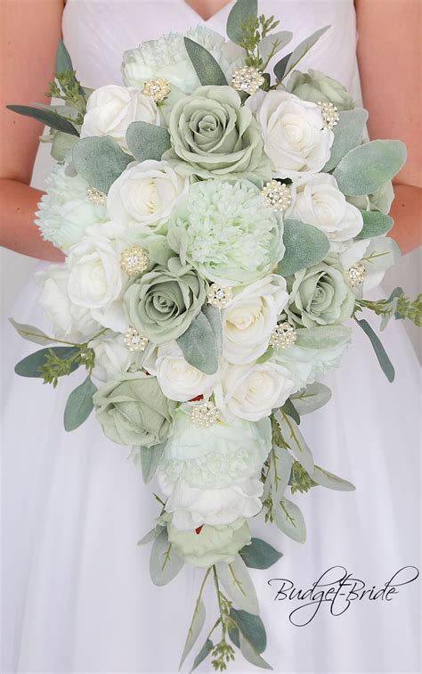 This Cascading Brides Bouquet Is Made With Mint Green Peonies Sage