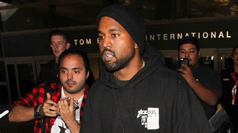 Kanye West Spotted Flying Economy From Lax Hiphopdx