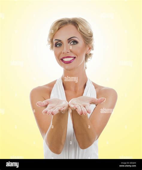 Woman Showing Something On The Palms Of Her Hands Stock Photo Alamy