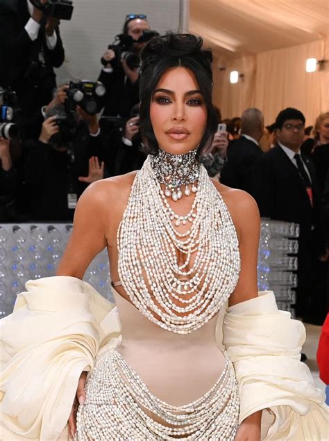 kim kardashian covers her curves in 50 000 real pearls for 2023 met gala 1 year after marilyn