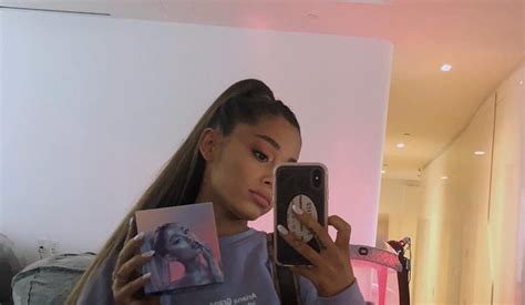 Can You Spot What's Weird In The Background Of Ariana ... When i take a selfie, i get the mirror image as a result.