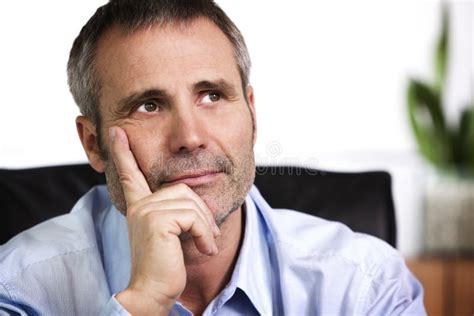 Confident Business Person Resting Chin On Hand Stock Photo Image Of