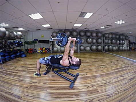 Lying Close Grip Barbell Triceps Extension Behind The Head