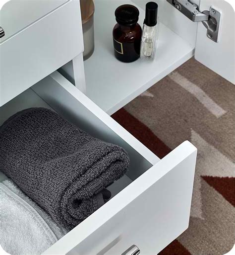 To go contemporary, pair your white cabinets with black hardware. Fresca Lucera 72" White Wall Hung Double Undermount Sink Modern Bathroom Vanity with Medicine ...