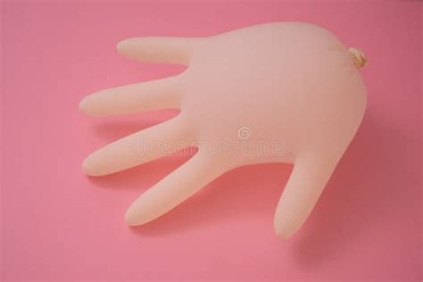 Inflated Latex Rubber Glove Isolated Against Pink Background Stock Image Image Of Safety
