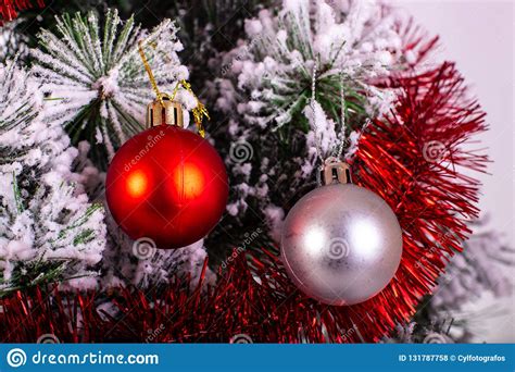 Christmas Decoration Red And Silver Balls In A Tree With Tinsel And