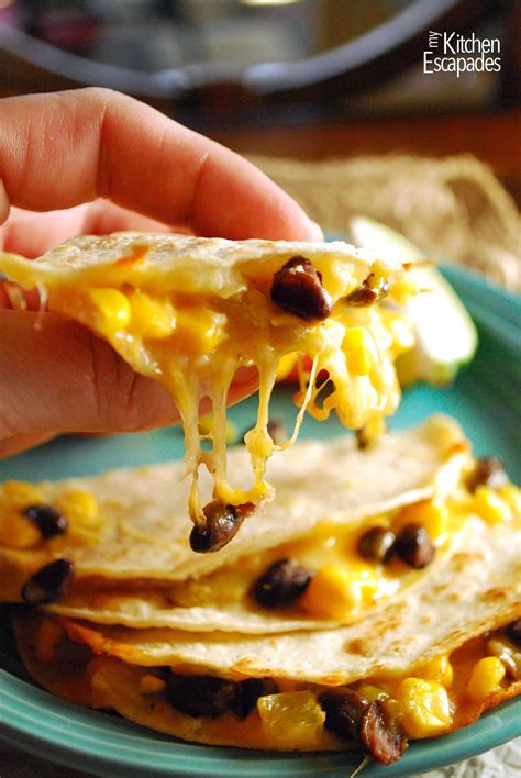 Grilled chicken, roasted corn, poblano and black bean relish, pepper jack, avocado and chipotle ranch on toasted jalapeño roll. Southwest Chicken Quesadillas | How to Make Quesadillas ...