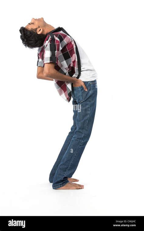 Young Indian Man Leaning Backwards Isolated On White Background Stock