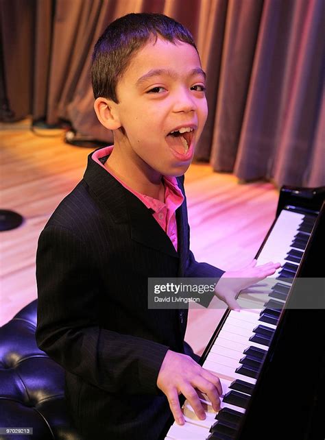 Pianist Ethan Bortnick Poses On Stage At The Grammy Museum At La