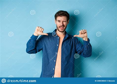 Confident Man Winking And Pointing At Himself Self Promoting Standing
