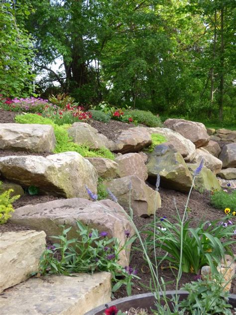 Creating Beauty And Structure With A Rock Wall Garden