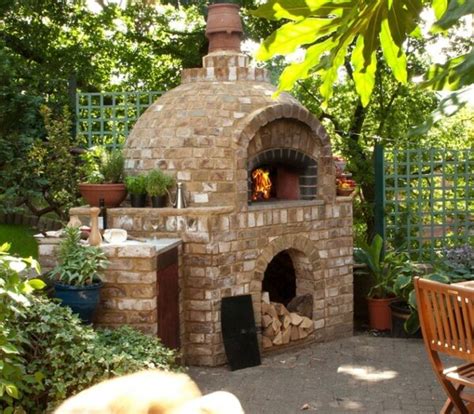 For the last couple of layers, i used a leftover board, some bricks and sand to create a form. Outdoor Brick Ovens • Insteading