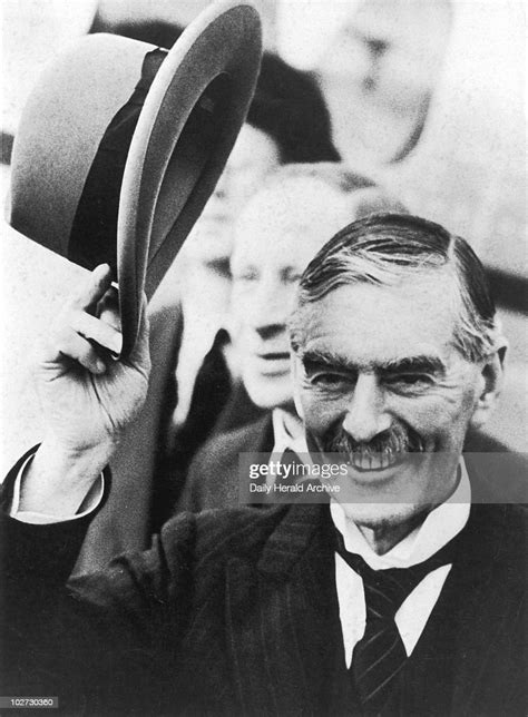 prime minister neville chamberlain greeting crowds on return 16 news photo getty images
