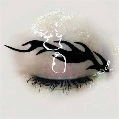 The dragon is misunderstood, she said. pinterest: waveringthought | Creative eye makeup, Makeup, Facial tattoos