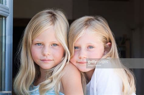 blond twin girls portrait blonde twins twin girls blonde