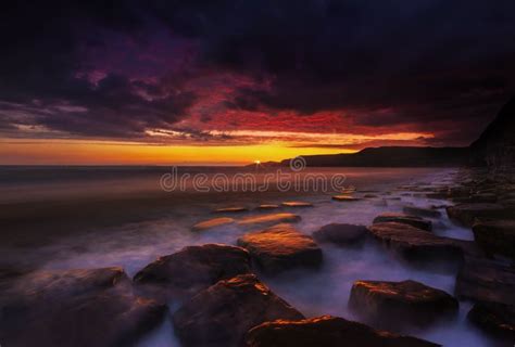 Rocky Dorset Coastline At Sunset Stock Image Image Of Clouds England