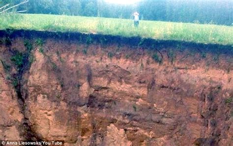 Russian Villagers Terrified As Foot Wide Sinkhole Opens Up Daily Mail Online