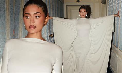 Kylie Jenner Sizzles In A Curve Hugging White Dress With Dramatic Cape