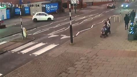 Mom Pushing Stroller Nearly Hit By Crashing Car Video