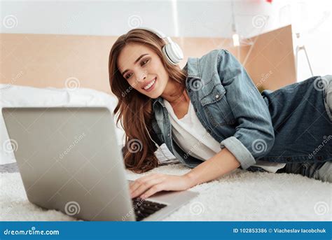 Cheerful Girl Smiling While Working On Laptop Stock Photo Image Of