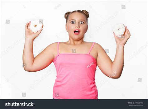 Funny Fat Little Girl Surprised Eating Foto Stock Editar Agora 470508179
