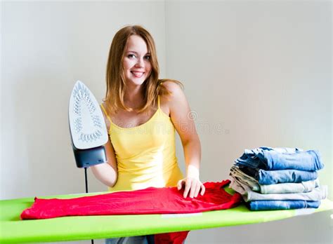 Happy Young Beautiful Woman Ironing Clothes Stock Photo Image Of