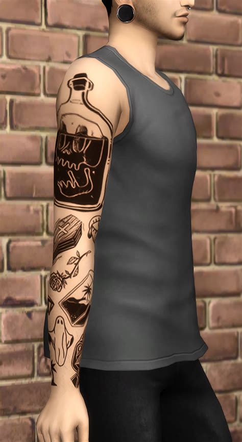 A Man With Tattoos On His Arms And Arm Is Standing In Front Of A Brick Wall