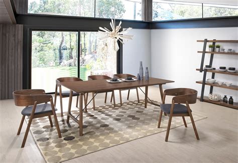 Choose from our mid century style compact round dining set that offers maximum style in a minimal amount of space or spread out with an expansive rectangular or square tabletop.our dining table models available in our midinmod houston and katy furniture stores. Modrest Oritz Mid-Century Modern Walnut Dining Set