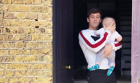 tom daley son meghan markle surprises olympic diver tom daley with a sweet t ahead of