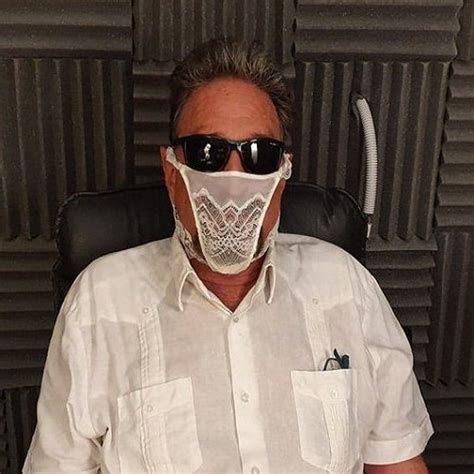 John Mcafee Arrested For Wearing A Woman’s Pant As A Mask