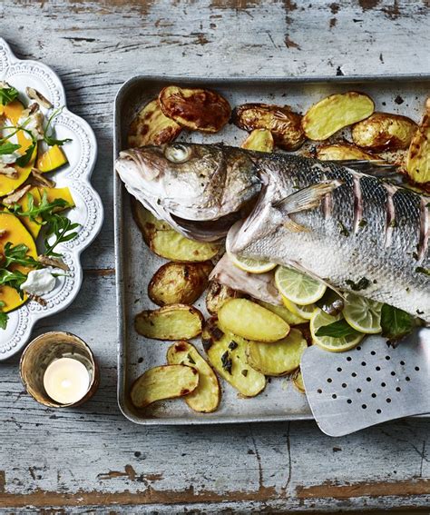 Baked Sea Bass On Potatoes Recipe Recipe Food Savoury Food Cooking