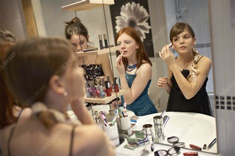 Teenage Girls Applying Make Up Stock Image F0037295 Science Photo Library