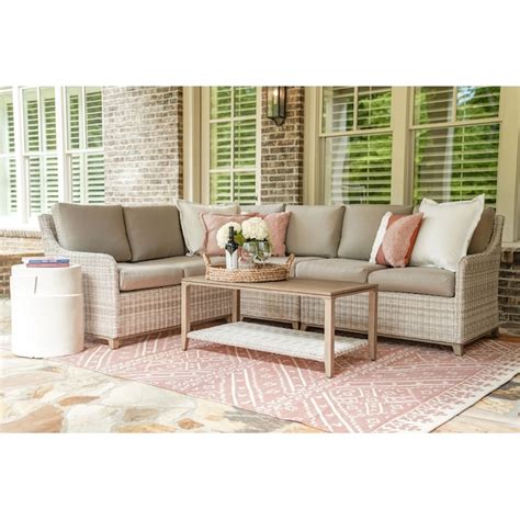 leisure made hampton wicker outdoor sectional with tan cushion s and aluminum frame in the
