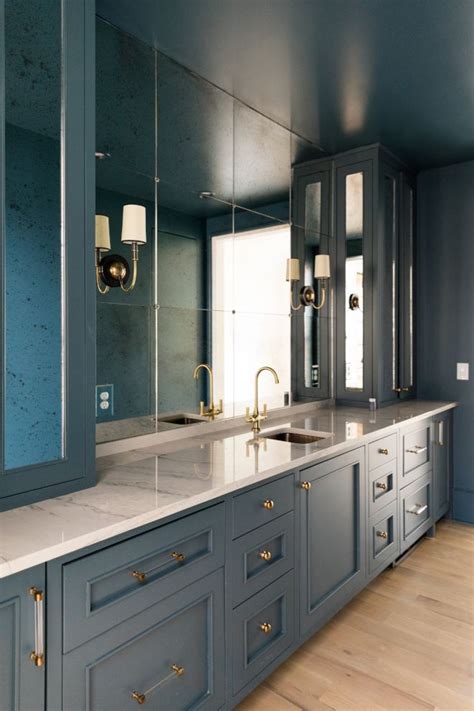 It's classic comstock fairytale, with the curvy roof and similar to benjamin moore waterbury cream and puritan gray. Cabinet paint color is Newburg Green HC-158 by Benjamin ...