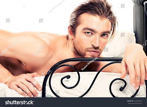 Handsome Nude Man Lying Bed Isolated Stock Photo 162502565 Shutterstock