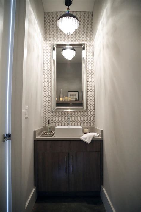 Powder room vanities come in a wide range of styles, from modern and industrial to farmhouse and rustic. Modern Powder Room with Mosaic Tile | HGTV