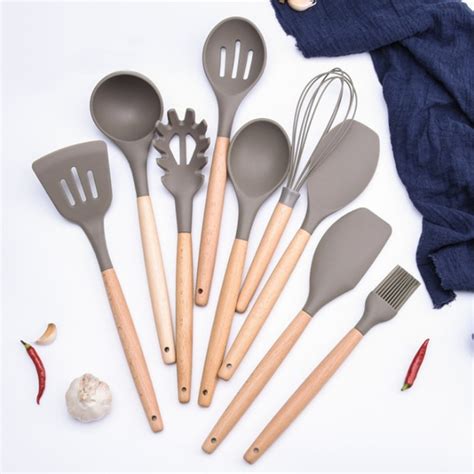 What makes silicone kitchen tools so great for cooking? Silicone Kitchen Utensils Set Gadgets Wood handle Cooking ...