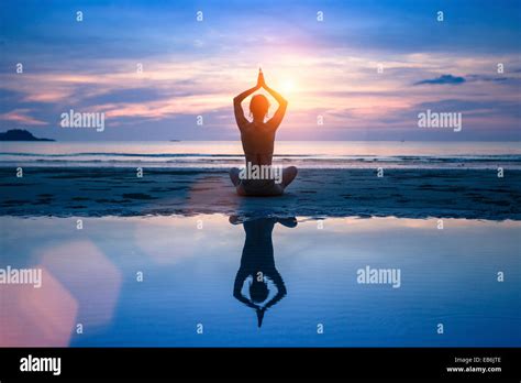 Yoga On The Sea Beach Meditation Stock Photo Alamy