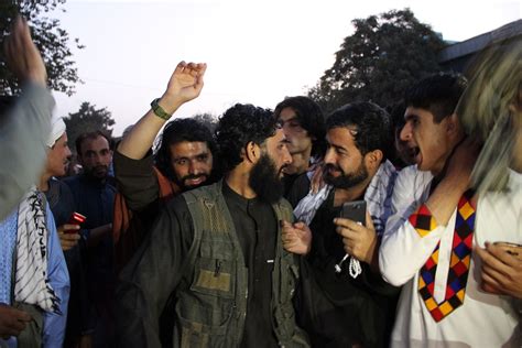 In Remarkable Scenes Taliban Fighters Join Eid Celebrations Across