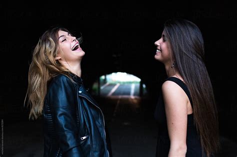 Two Female Friends Having Fun Together By Stocksy Contributor Michela Ravasio Stocksy