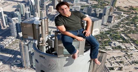 Released by emaar properties the. Here is a picture of Tom Cruise sitting on top of Burj ...