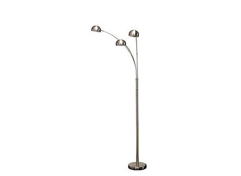 We once had a sofa angled in the corner. Perfect for tucking behind a sofa or placing in a corner, this Domino 3-arc floor lamp will ...