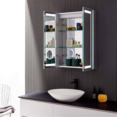 The door is almost as wide as the cabinet and has a mirror. Dreamwerks 24 in. x 32 in. Wall-Mounted LED Medicine ...