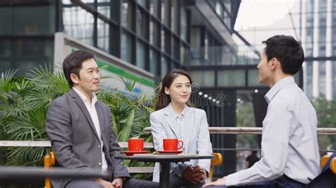 Asian Business People Meeting Client In Outdoor Coffee Shop Stock Footage Video Of Handshake