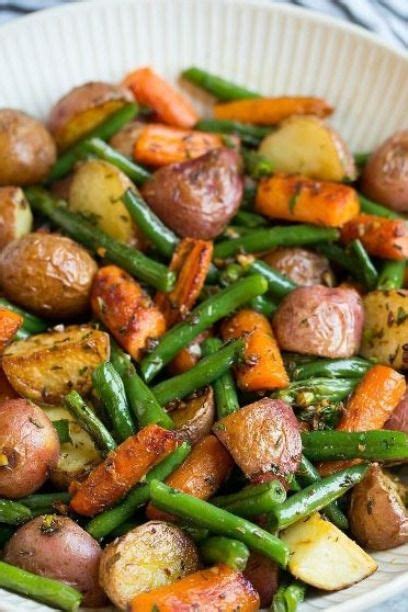 Toss green beans in bowl with remaining 1/2 tbsp olive oil and season lightly with salt. Garlic Herb Roasted Potatoes Carrots and Green Beans in ...