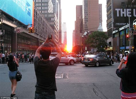 Manhattanhenge Sunset Thrills New Yorkers Who Crowd The Streets To