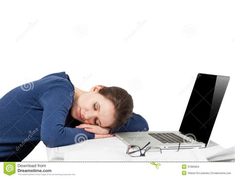 Portrait Of Tired Young Woman Sleeping On Working Place Stock Photo