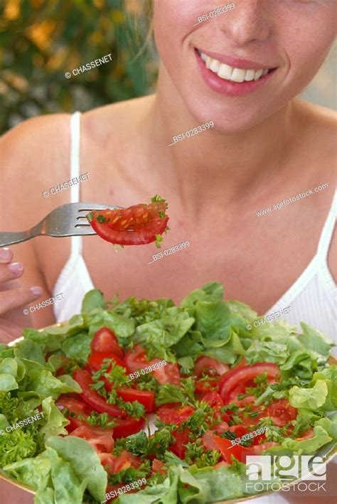 Woman Eating Salad Stock Photo Picture And Rights Managed Image Pic