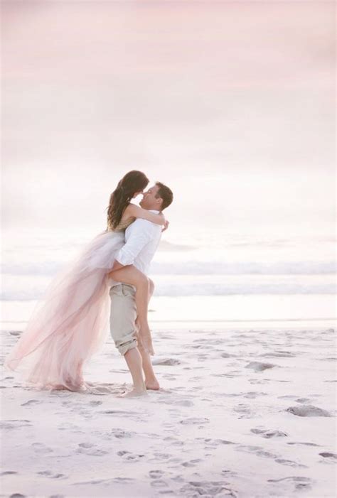 Soft sand between your toes, the sunset painted on the water, and the ocean breeze caressing your face are everything you want in a beach wedding. 30 Romantic Beach Engagement Photo Shoot Ideas | Deer ...