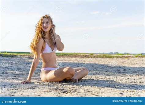 Lovely Blonde Bikini Model Posing Outdoors On A Caribbean Beach Stock Photo Image Of Model